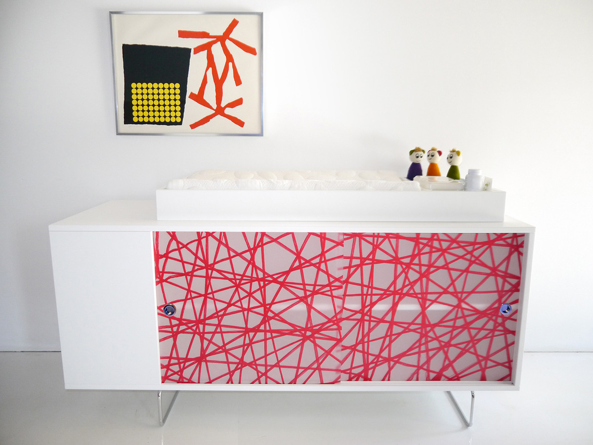 Alto Credenza shown with Red Strand panels and optional changing tray.