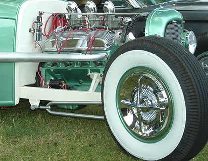 Crossbar Hubcaps on an Amazing Hot Rod.