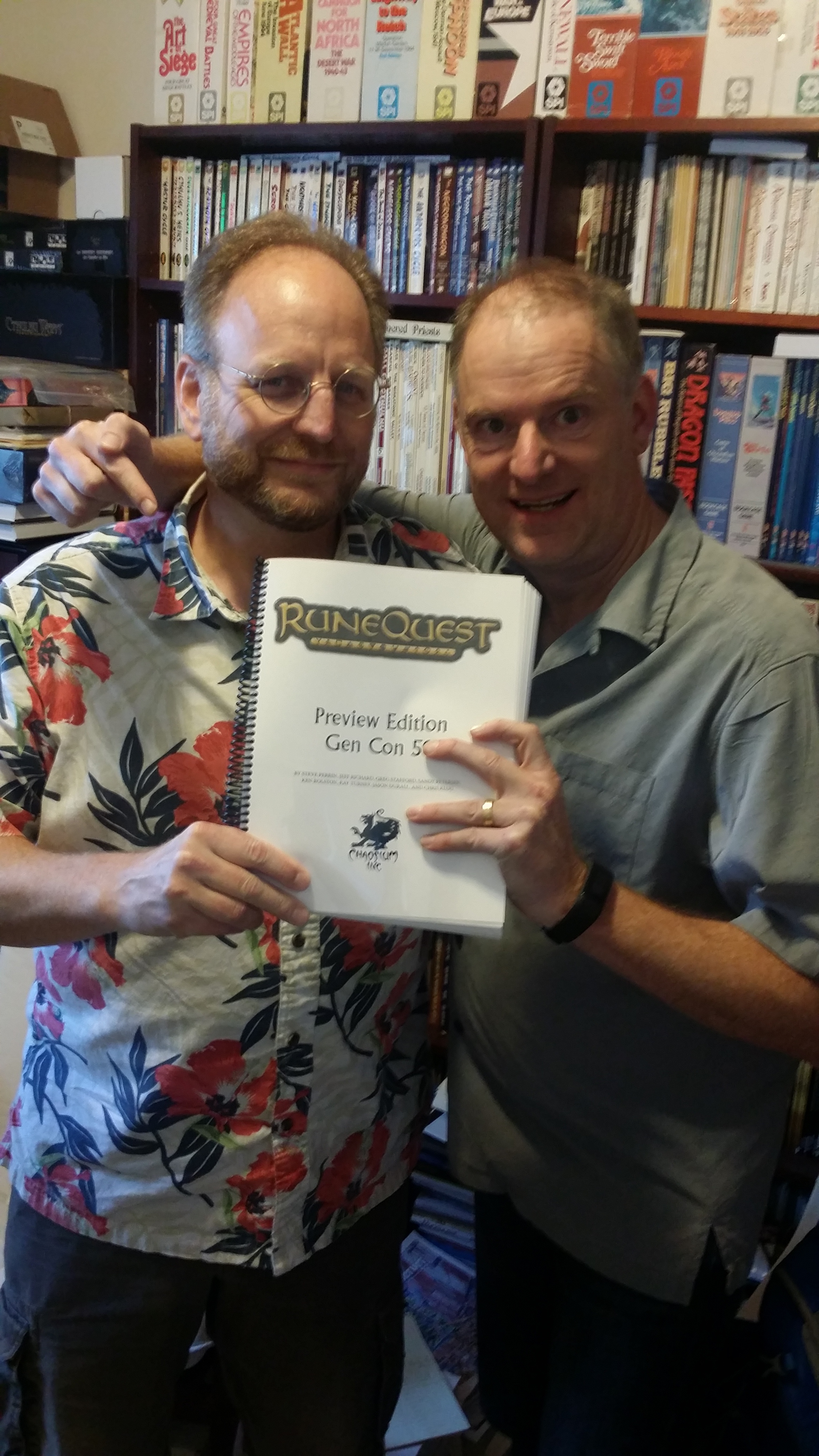Rick and Jeff, showing off the special RuneQuest preview copies
