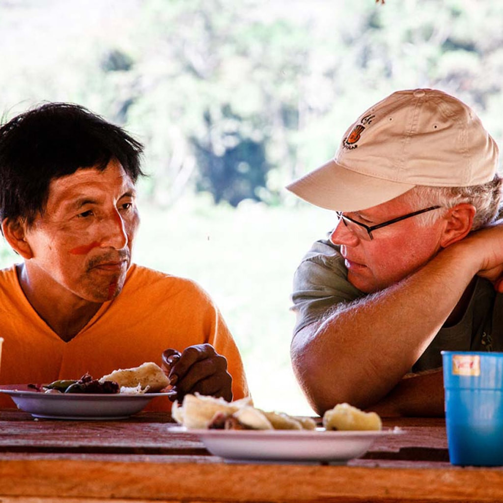 Bill Harris from Cafe Campesino talking with a coffee trading partner in San Martin de Pangoa Peru