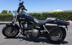 Rennoy's Harley-Davidson Dyna Fat Bob w/ Swing Arm Leather Solo Bag