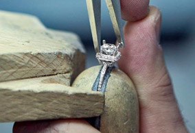Engagement ring stone tightening