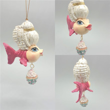 Madame Pink Cupcake Kissing Fish Ornament has been handmade and hand painted.