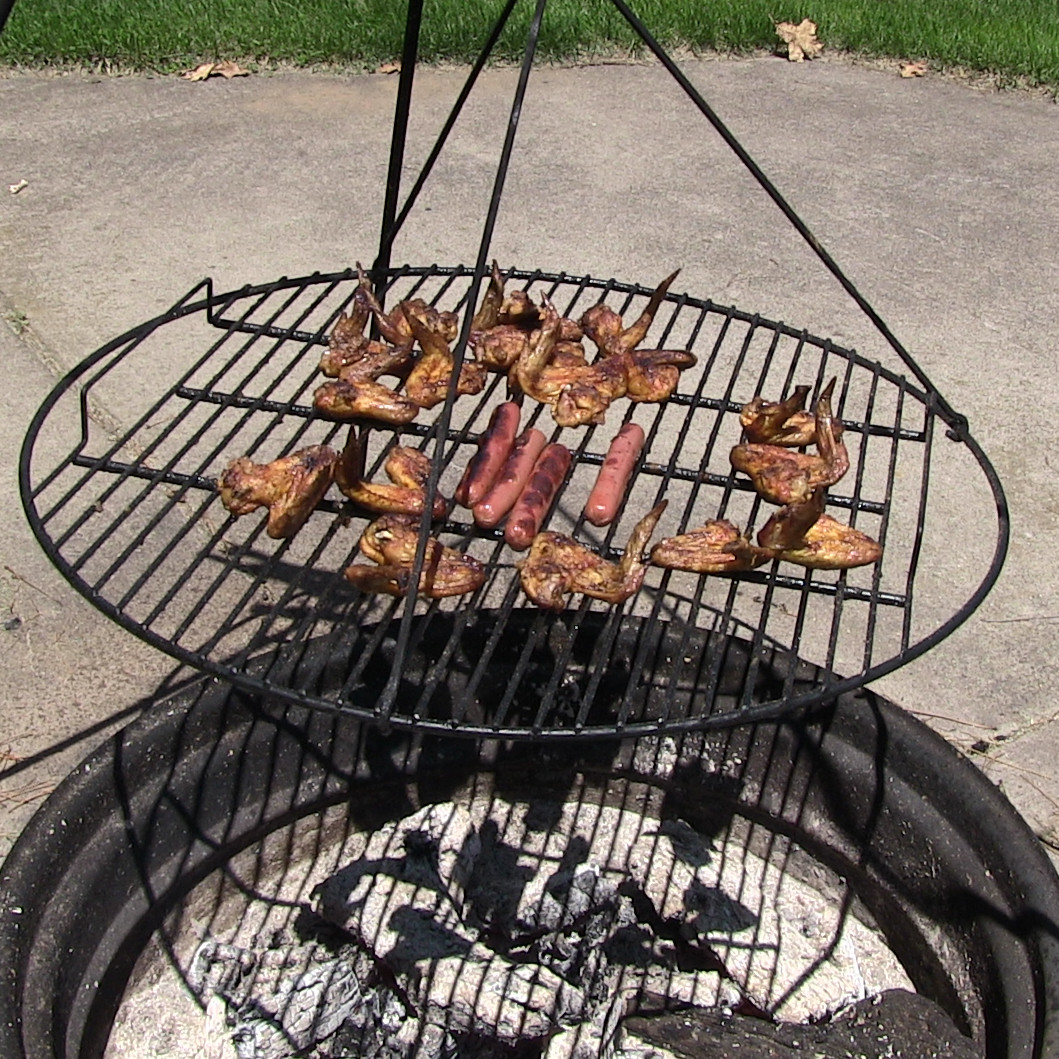 Turn your fire pit into a relaxing place to barbecue your favorite foods with this Sunnydaze round grill grate for fire pits.