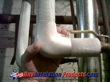 placing-pvc-90-degree-elbow-cover-over-fiberglass-insert-insulation.png