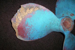 Boat propeller with cavitation damage