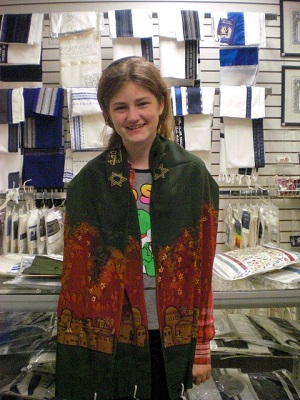 JEWELL - BAT MITZVAH IS JANUARY 27, 2018. JEWELL CHOSE A SILK BIJOUX HAND PAINTED JERUSALEM MOTIF IN GREEN AND EARTH TONES.