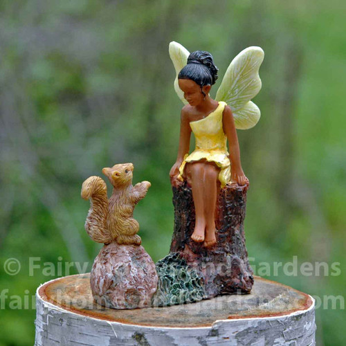 Fairy Making Friends with a Little Squirrel